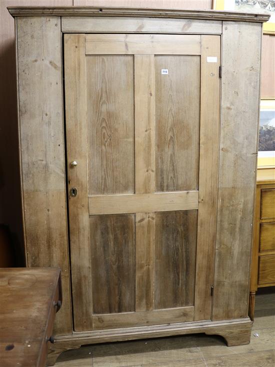 A pine wardrobe W.126cm